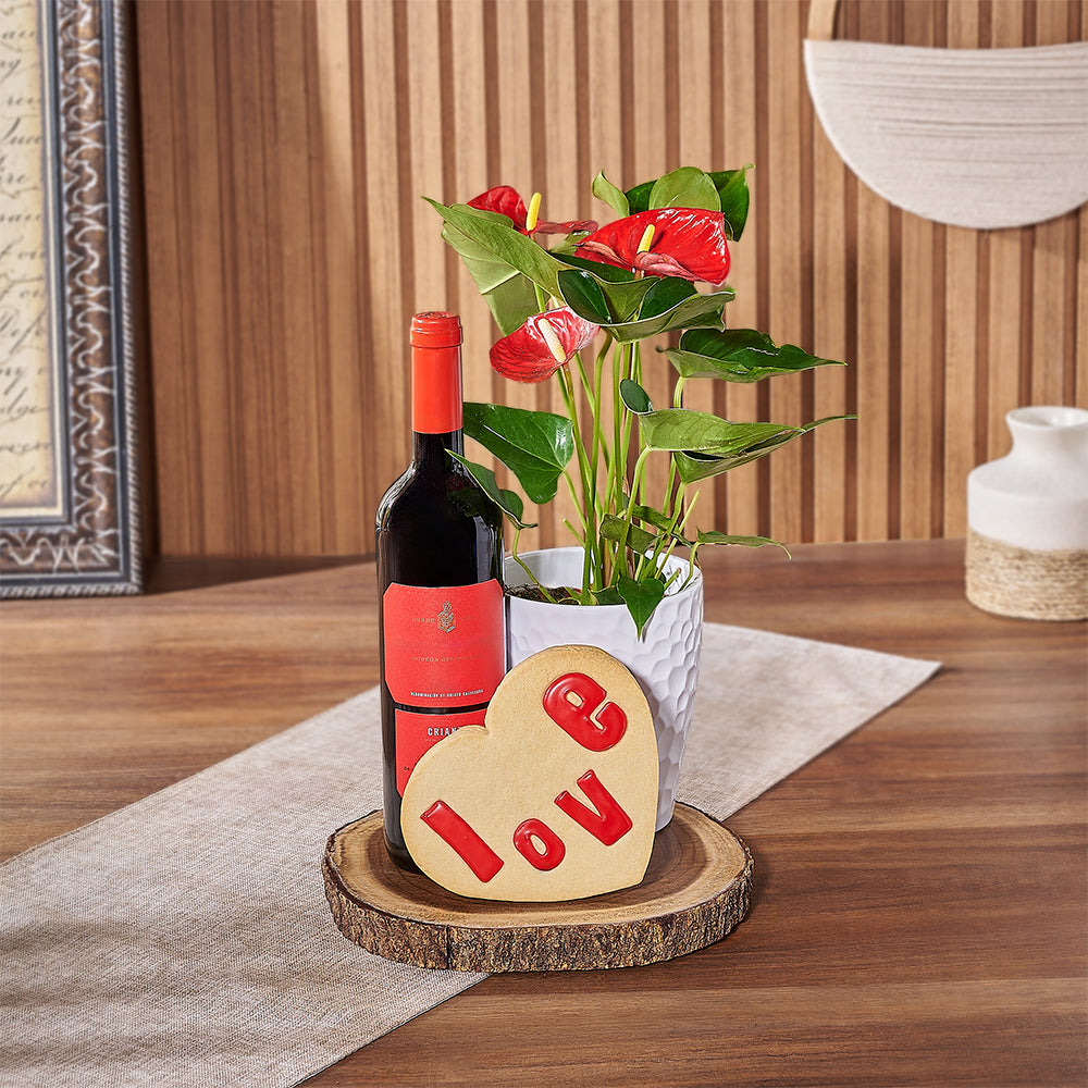 Elegant Wine Gift Basket with Heart-Shaped Sugar Cookie and Anthurium Plant – how the gift is presented