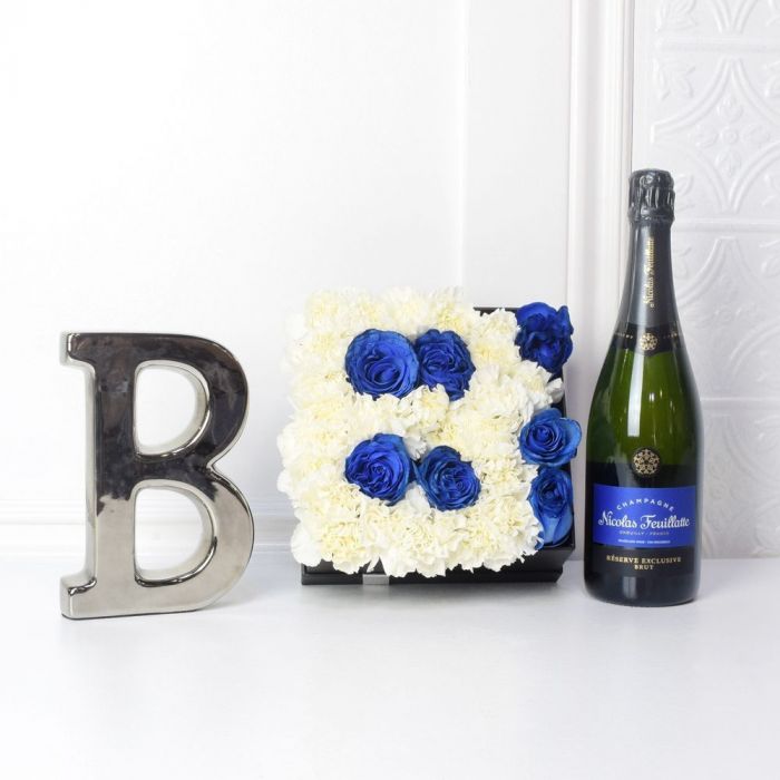 Stylish Champagne Gift with Floral Letter B Arrangement – how the gift is presented