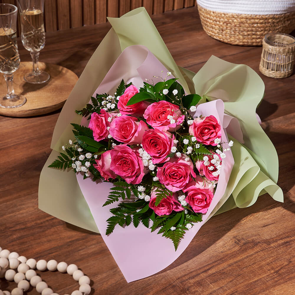 12 Pink Roses with Baby’s Breath Floral Wrap Bouquet – how the gift is presented