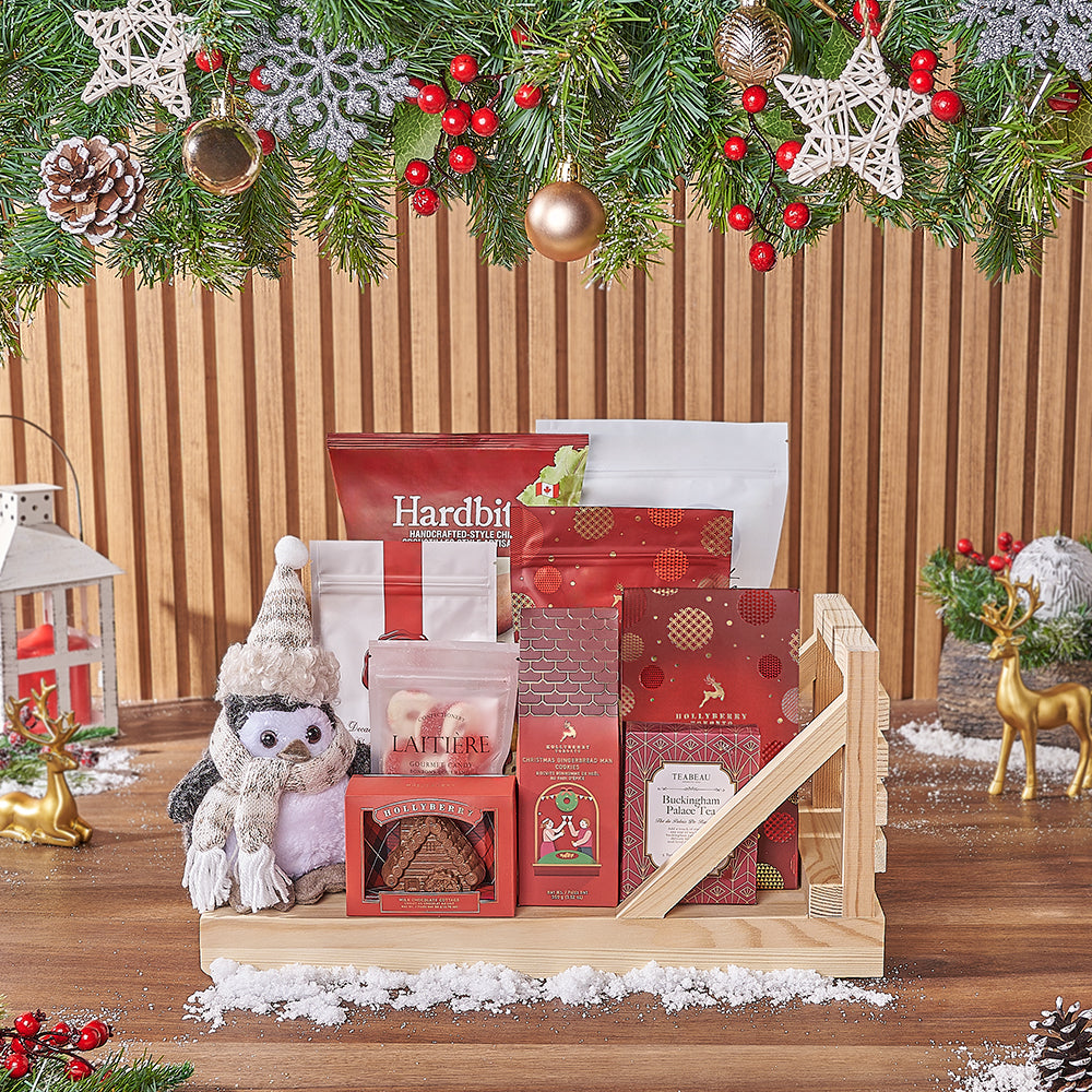 Holiday Gourmet Delights Gift Basket with Plush Penguin and Wooden Sleigh – how the gift is presented